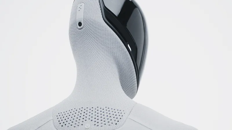 The head and shoulders of a Figure 03 humanoid