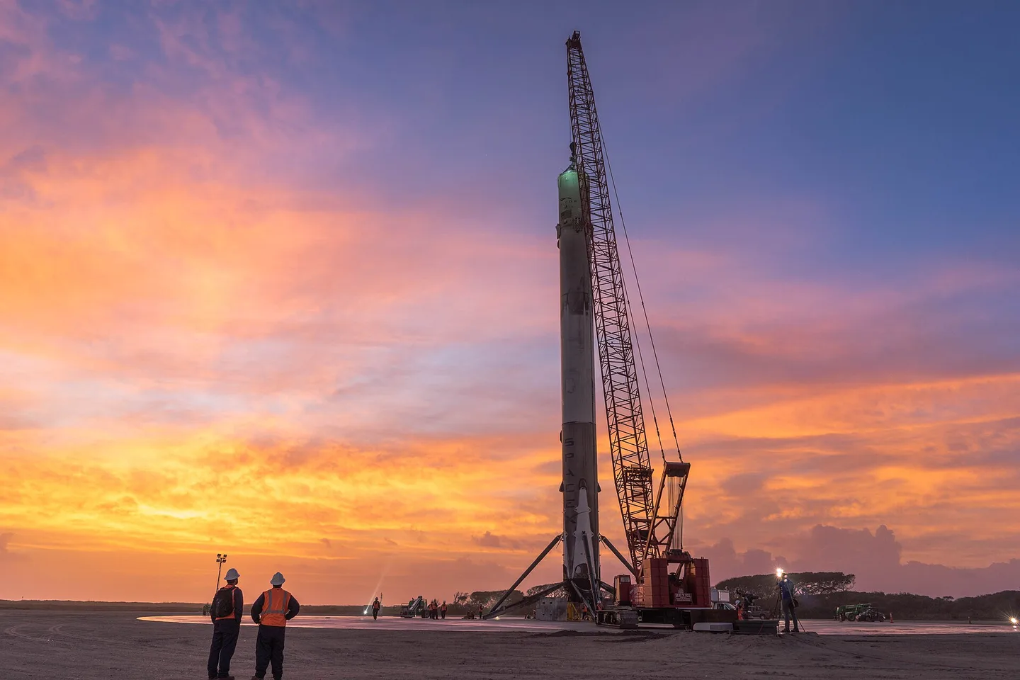 Recovered Falcon 9 first stage standing at Landing Zone 1