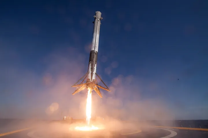 Falcon 9 first stage touching down on a droneship at sea